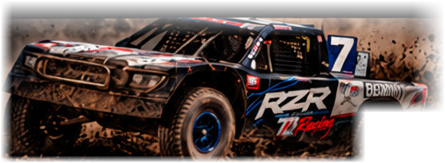 TJ Racing truck racing through the dirt
